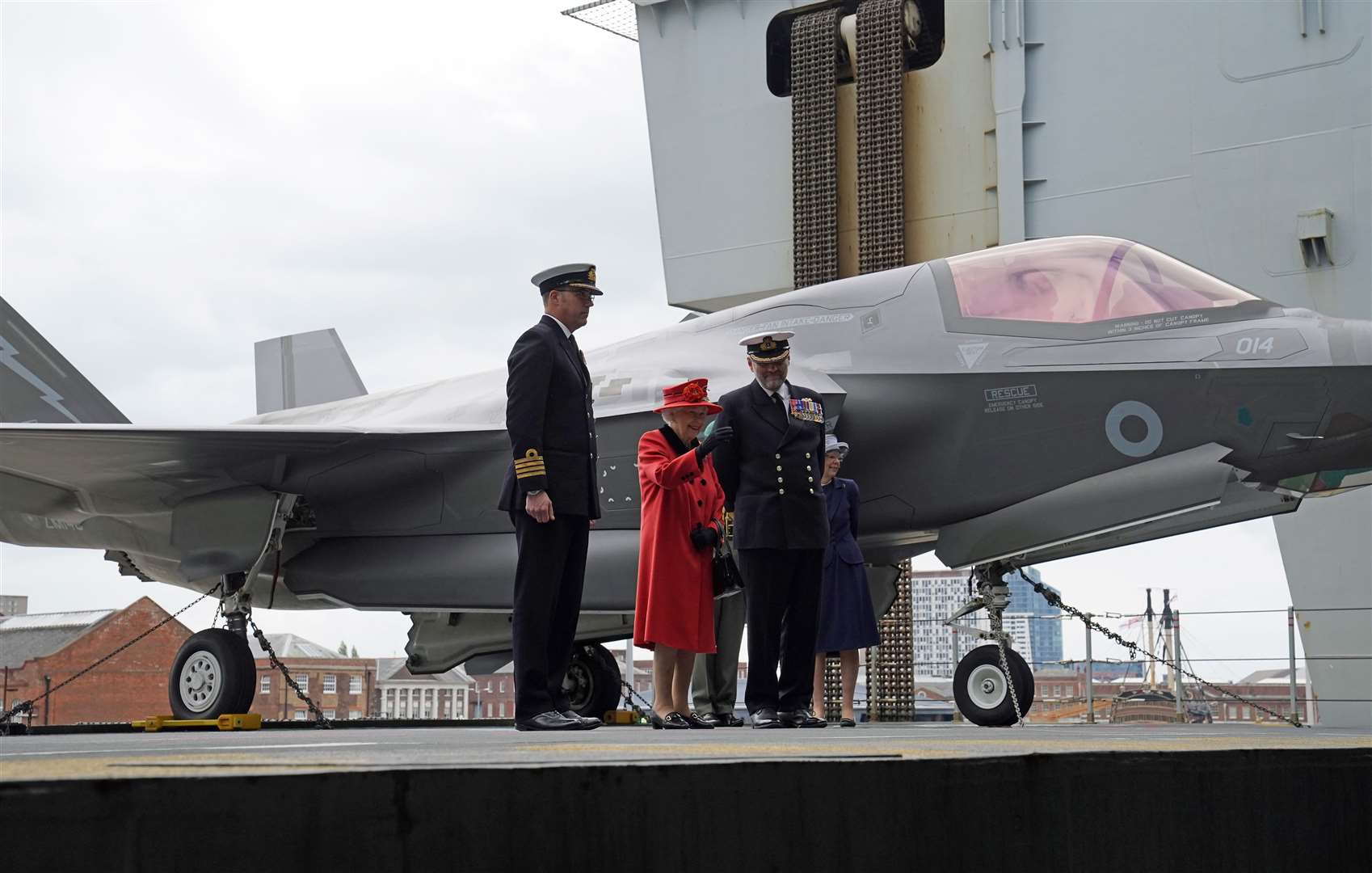 Captain Angus Essenhigh (left) greets the Queen (Steve Parsons/PA)