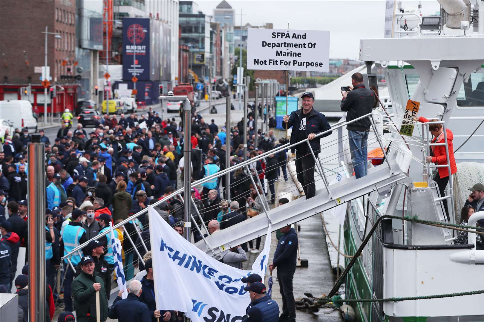 Fishermen protesting outside the Convention Centre in Dublin (Niall Carson/PA)