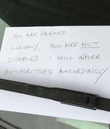 The note posted on the windscreen of Yasmin's Vauxhall Corsa