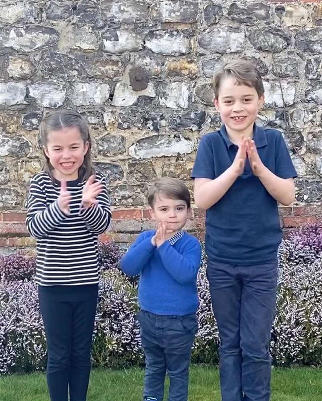 In March Princes George (right), and Louis (centre) and Princess Charlotte joined the national applause for the NHS (Duke and Duchess of Cambridge/PA)