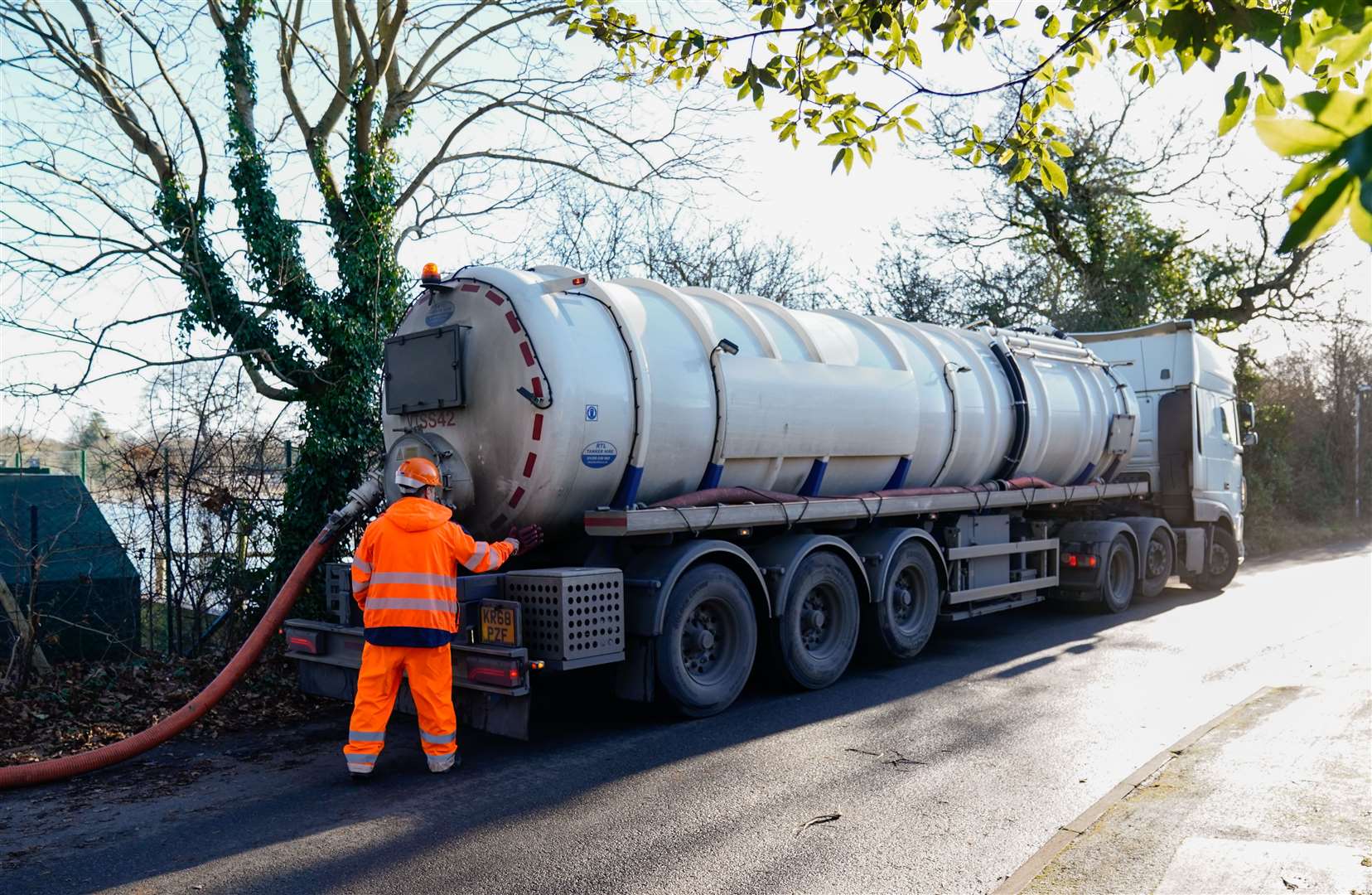 A tanker pumps out excess sewage from the Lightlands Lane sewage pumping station in Berskhire which flooded after heavy rainfall (Andrew Matthews/PA)