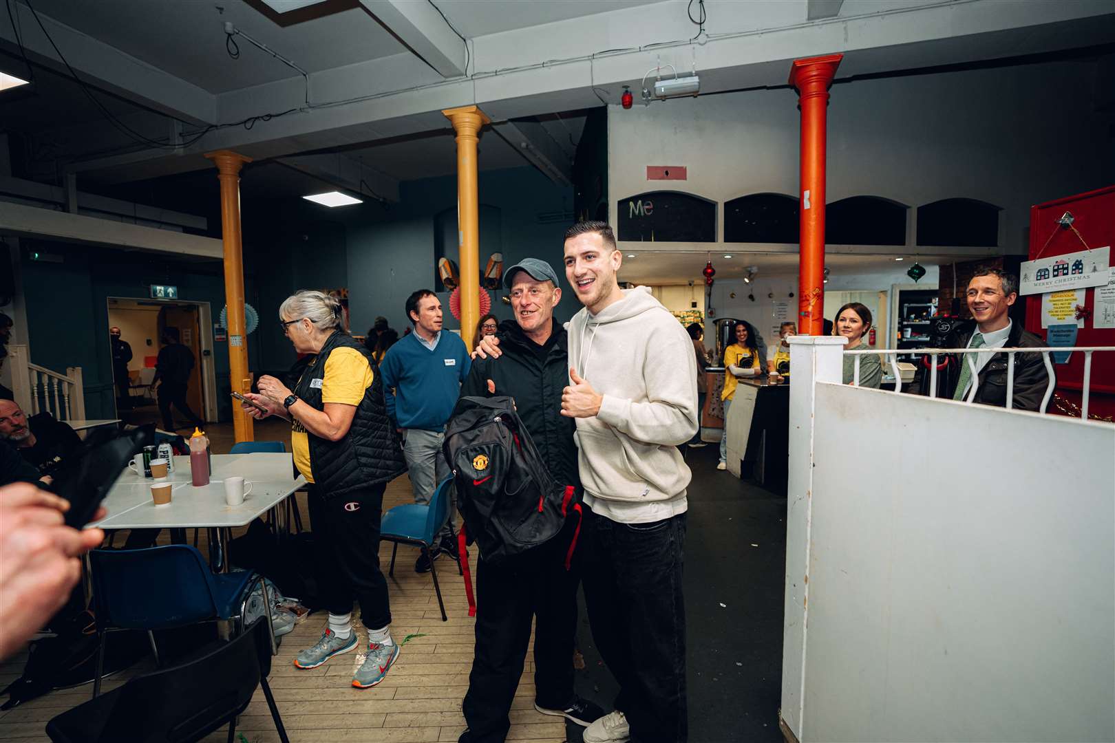 Diogo Dalot, right, said he wanted to raise awareness about homelessness (Zohaib Alam/Manchester United/PA)