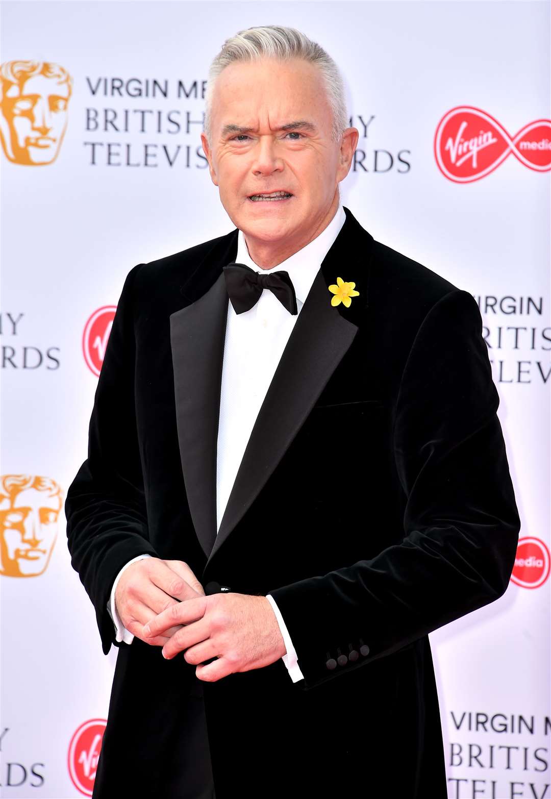 Huw Edwards has been asked by the BBC to repay the £200,000 salary he has received since his arrest (PA)