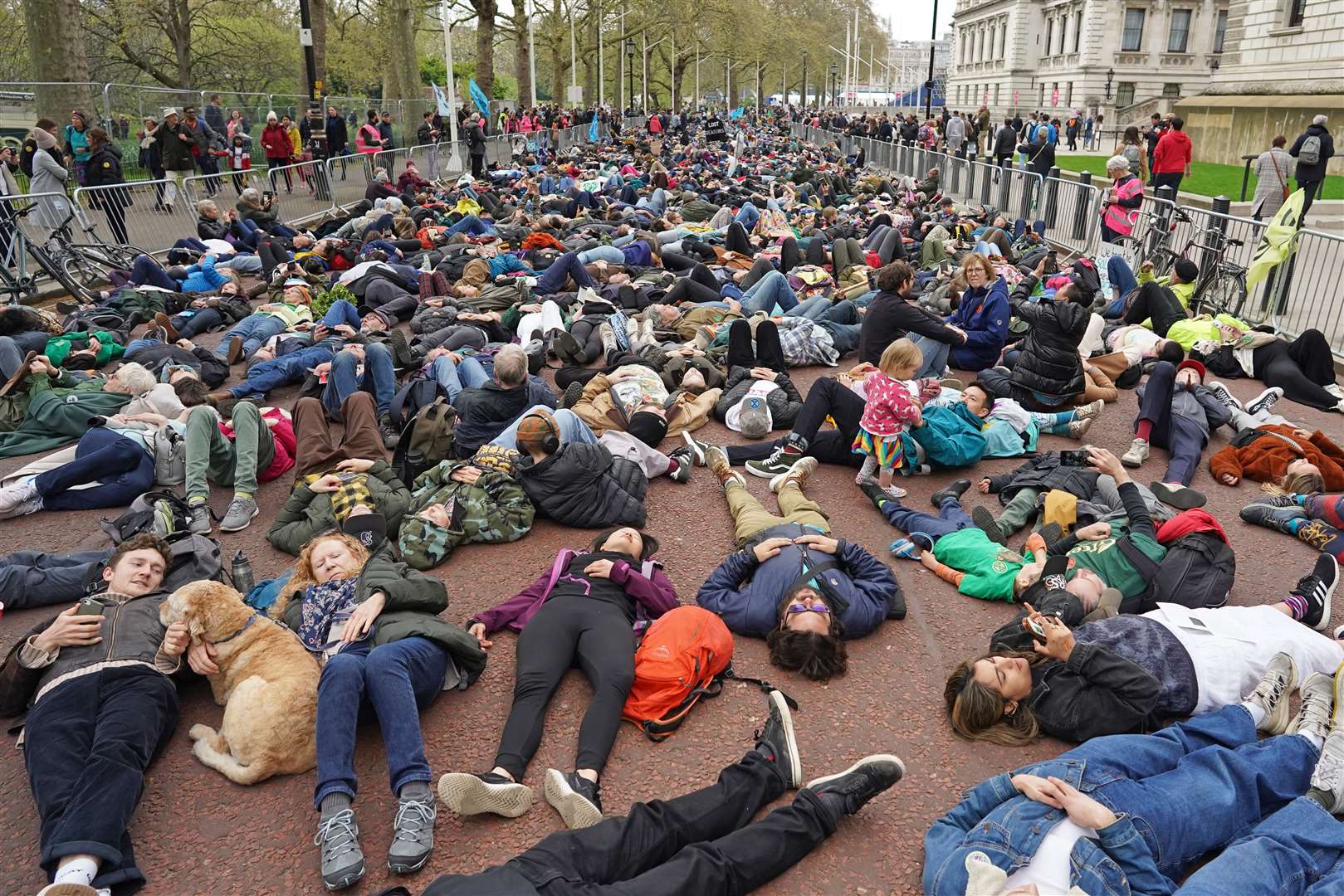 The ‘die-in’ on Saturday, which aims to represent people dying due to the climate crisis (Stefan Rousseau/PA) 