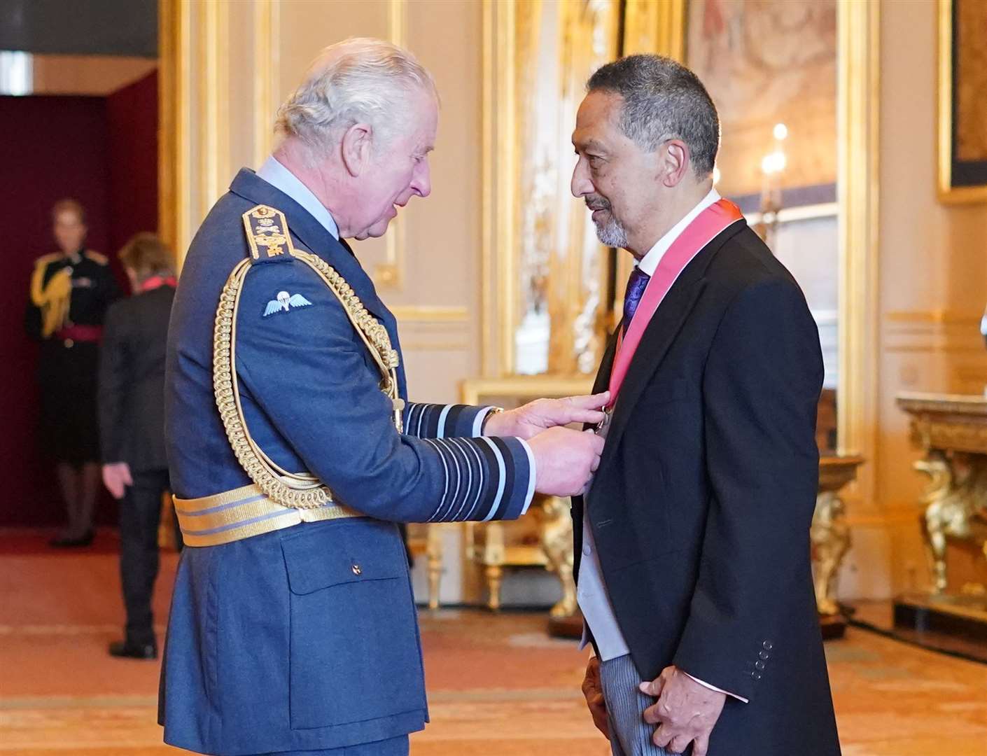 Charles carrying out an investiture on the day he met the Queen (Jonathan Brady/PA)