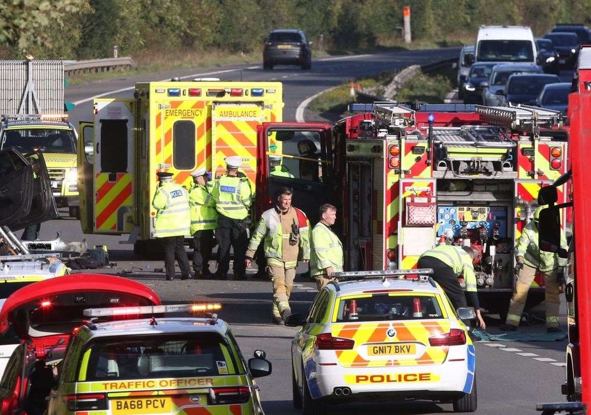 Police at the scene of the crash. Picture: UKNIP (18872169)