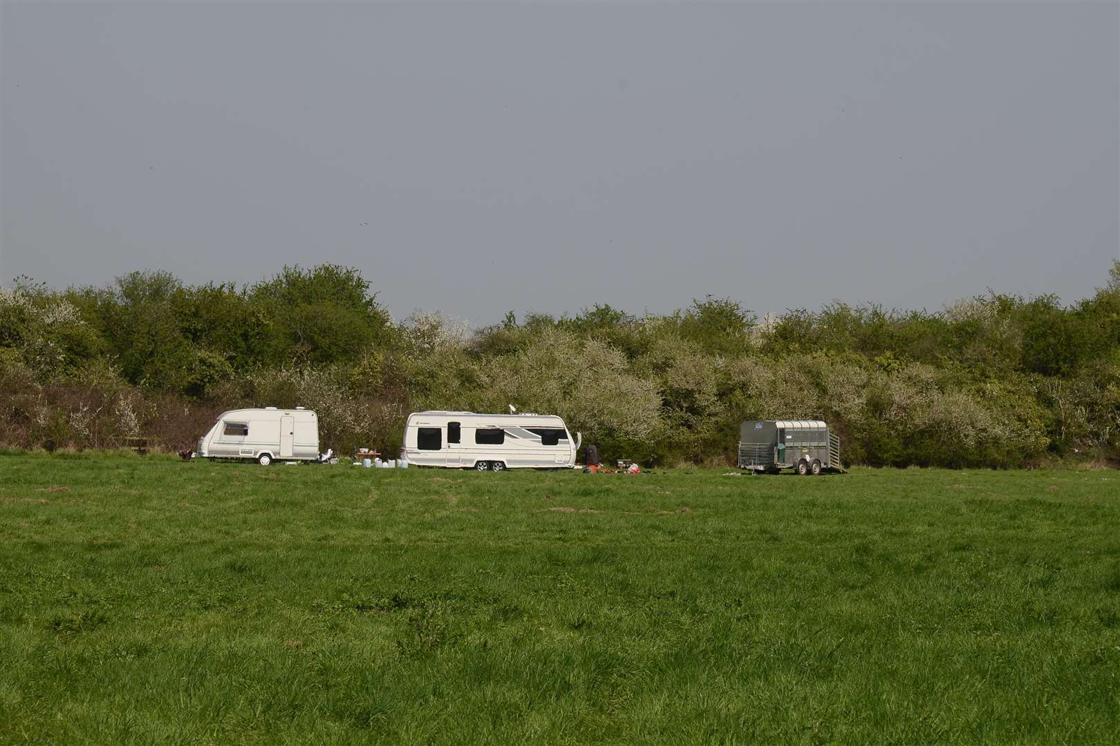 Some of the travellers camped out in a field at Riverside Country Park