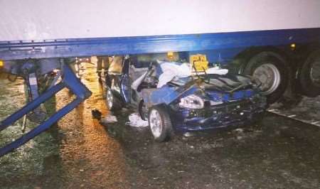 The remains of the Vauxhall Corsa after it collided with a jack-knifed lorry on the M2. Picture courtesy KENT FIRE & RESCUE SERVICE