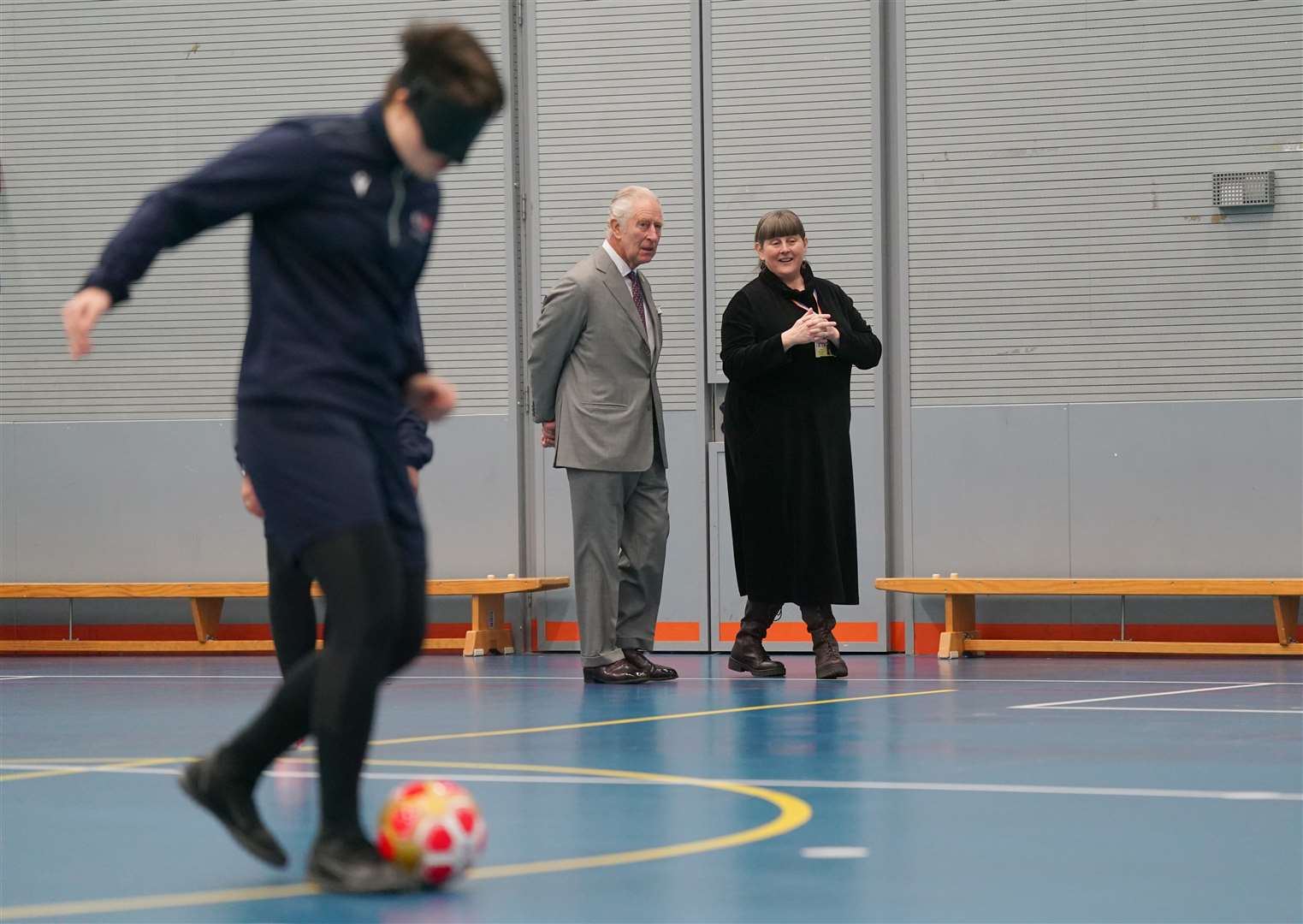 King Charles watching a demonstration of blind football during his visit to Royal National College for the Blind (RNC) in Hereford (Jacob King/PA)