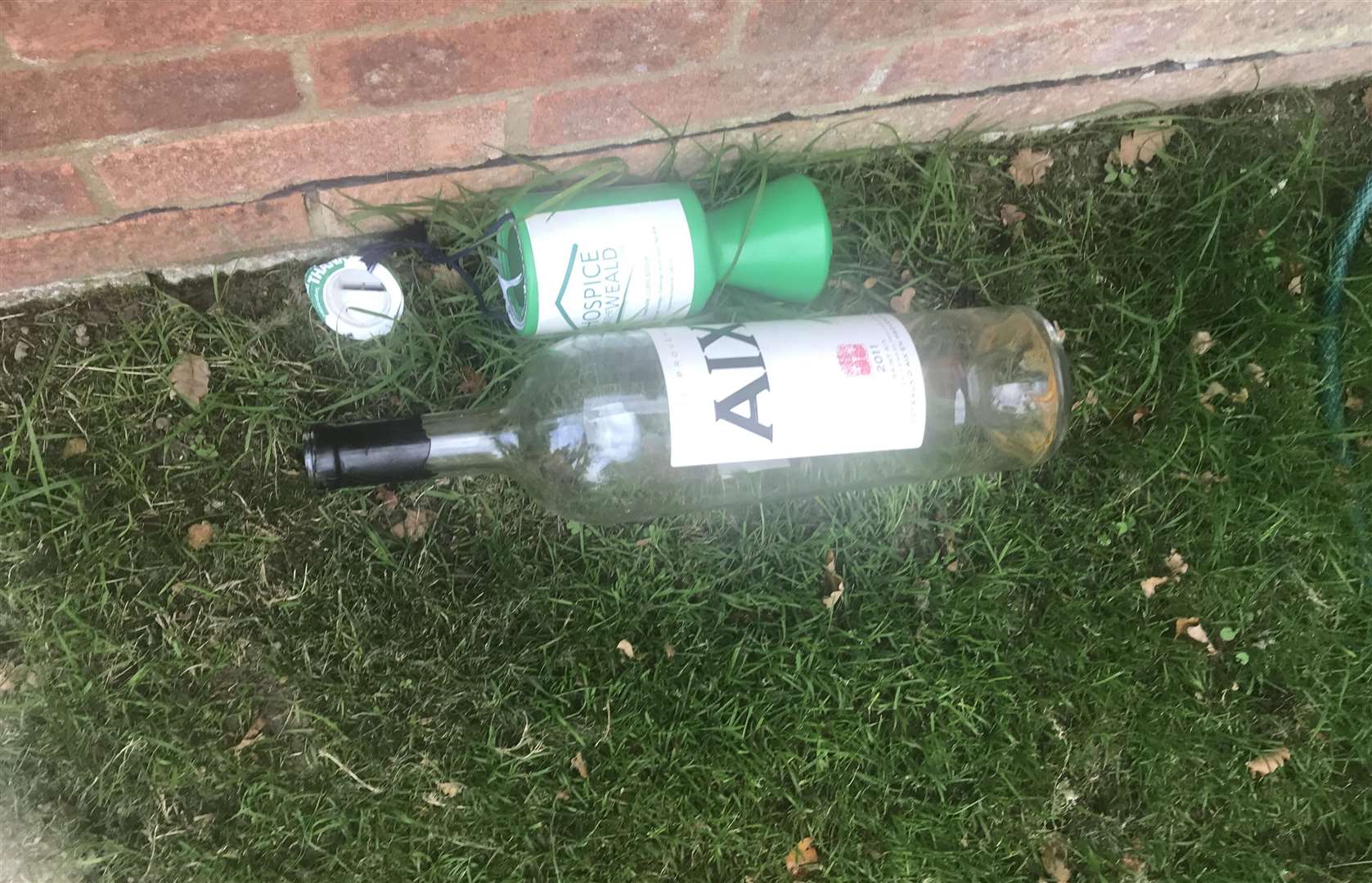 The discarded Hospice in the Weald tin and captain's bottle