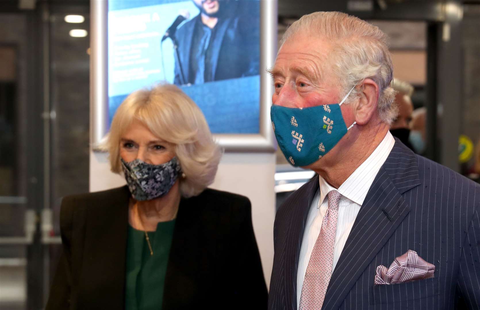 The Prince of Wales and Duchess of Cornwall, wearing masks, during a visit to the Soho Theatre in London (Chris Jackson/PA)