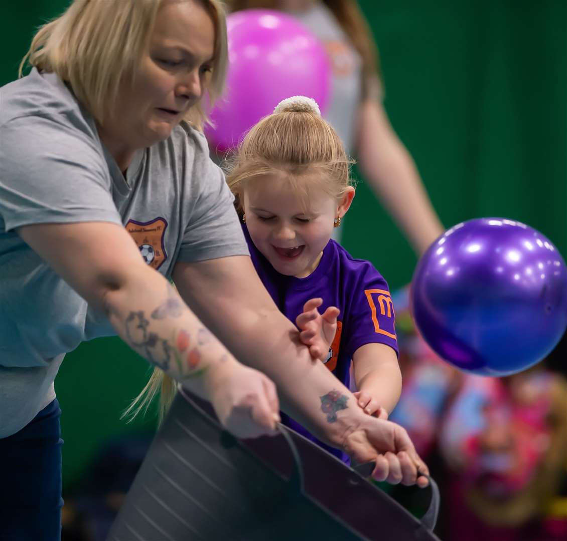 Lilly-Rose with Laura Smith, founder of Ashford Sensory Football Club. Picture: Gemma Lawrence