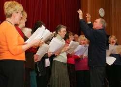 Dr Mark Deller and his choir