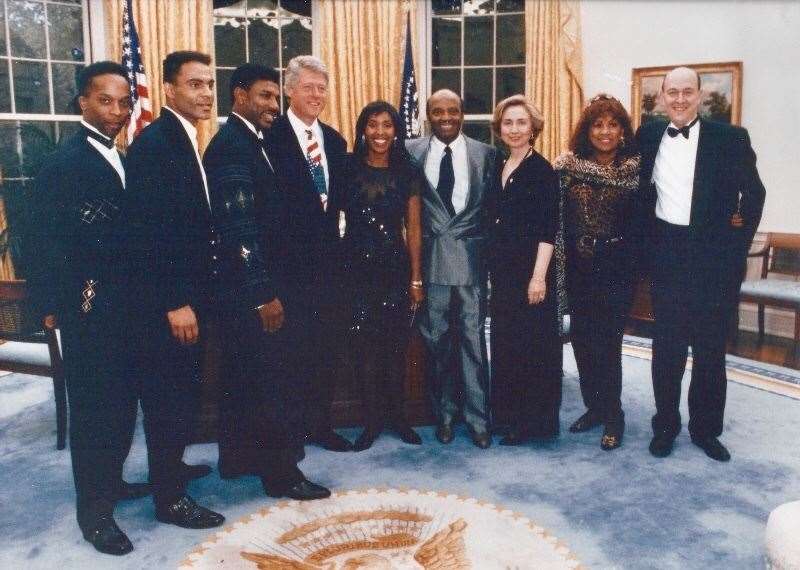 Phil (far right) with Bill and Hillary Clinton and The Drifters at the White House