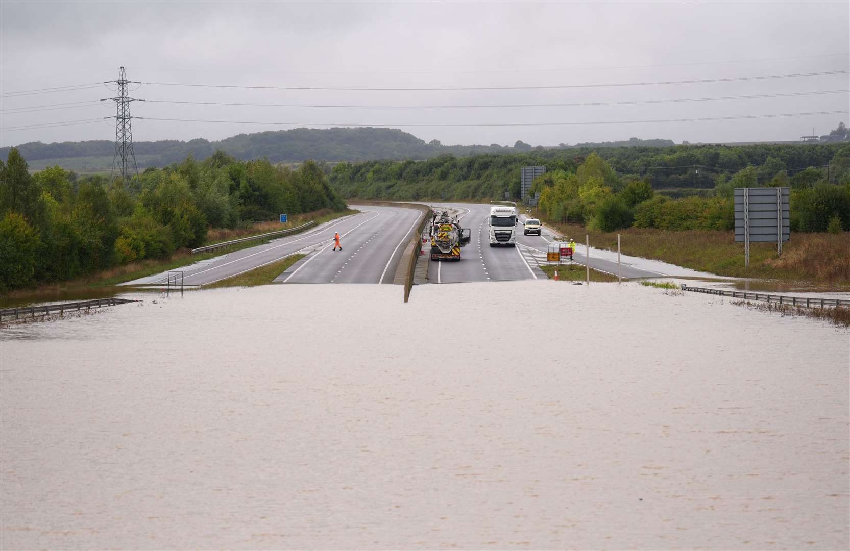 Flood water on the A421 in Marston Moretaine, Bedfordshire a week ago (Joe Giddens/PA)