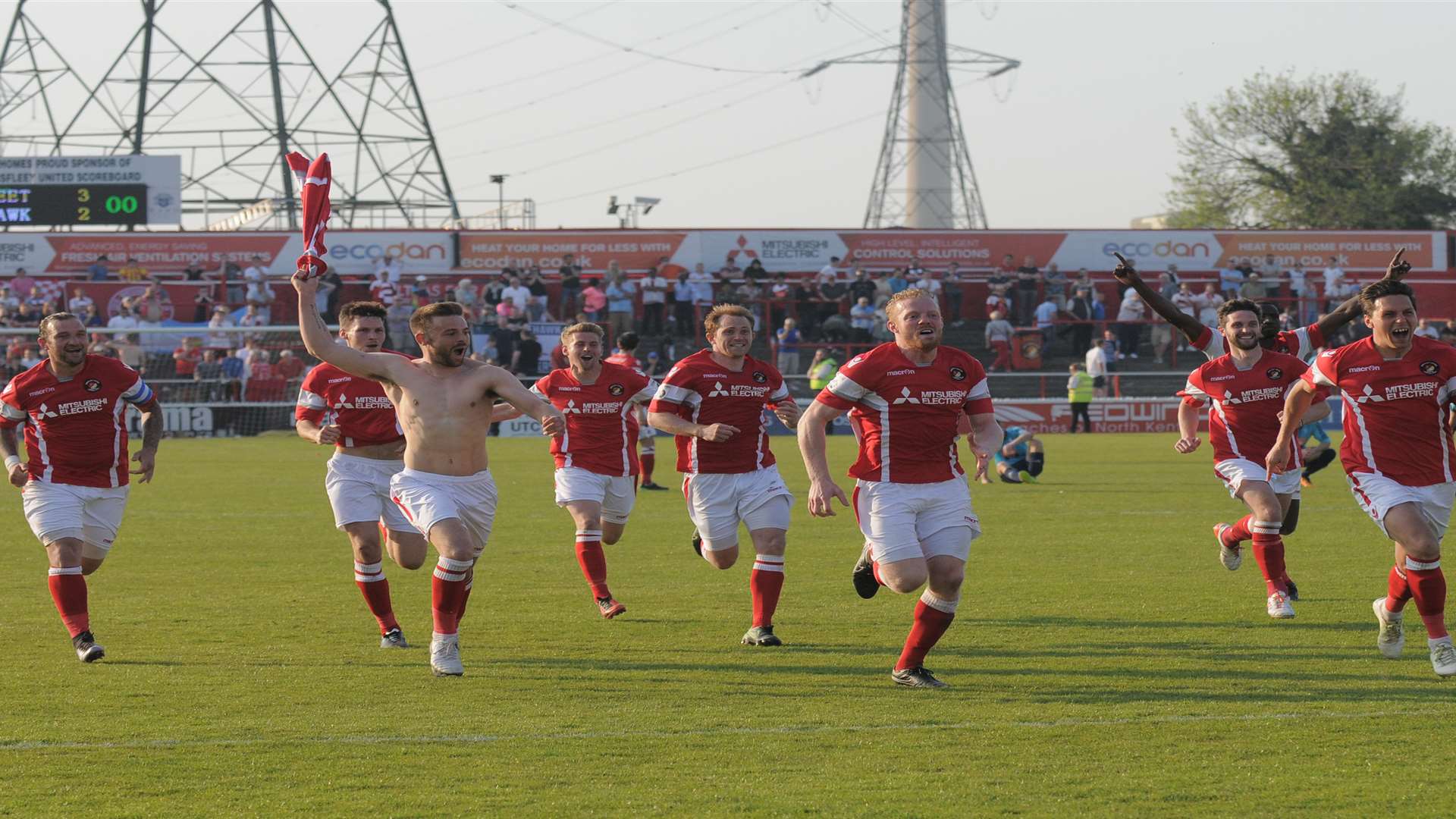 Ebbsfleet players run towards their fans after winning the penalty shootout Picture: Ruth Cuerden