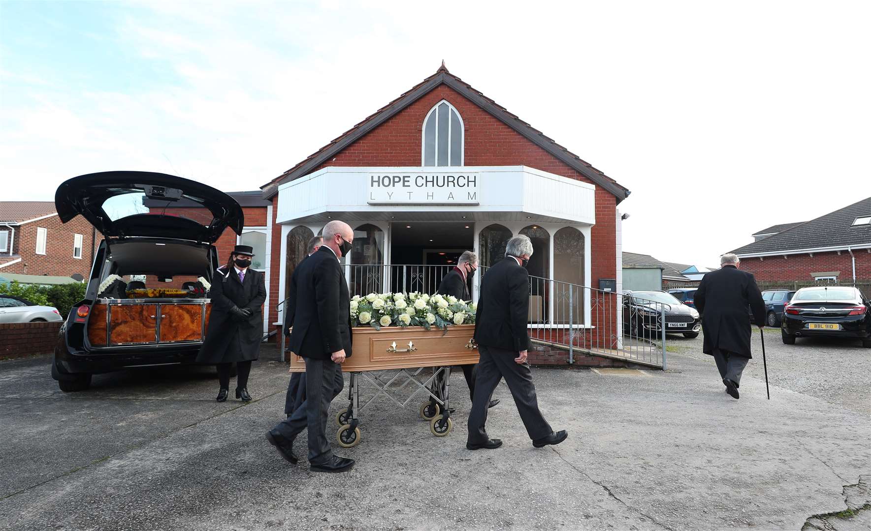 The coffin of entertainer Bobby Ball is taken into Hope Church in Lytham (Peter Byrne/PA)