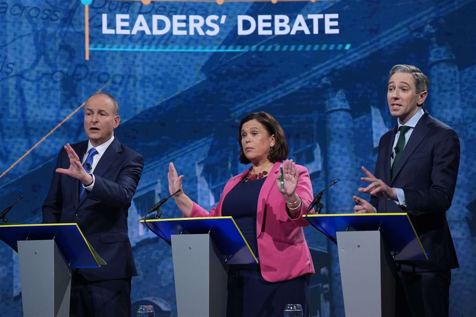 Politicians Micheal Martin, left to right, Mary Lou McDonald and Simon Harris took part in a final TV leaders’ debate on November 26, days before the General Election (Niall Carson/PA)