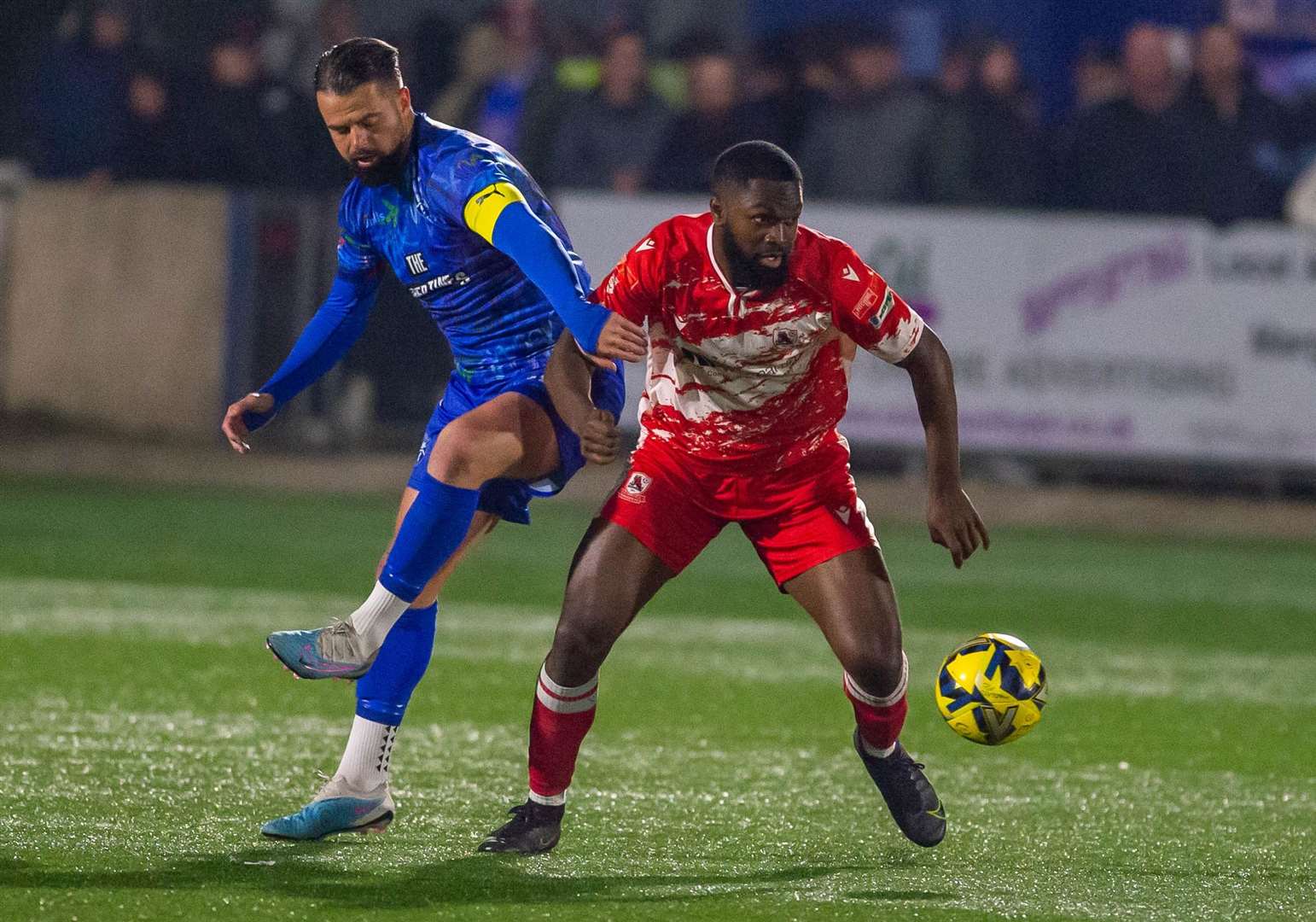 Blaise Riley-Snow fends off Margate goalscorer Ben Greenhalgh. Picture: Ian Scammell