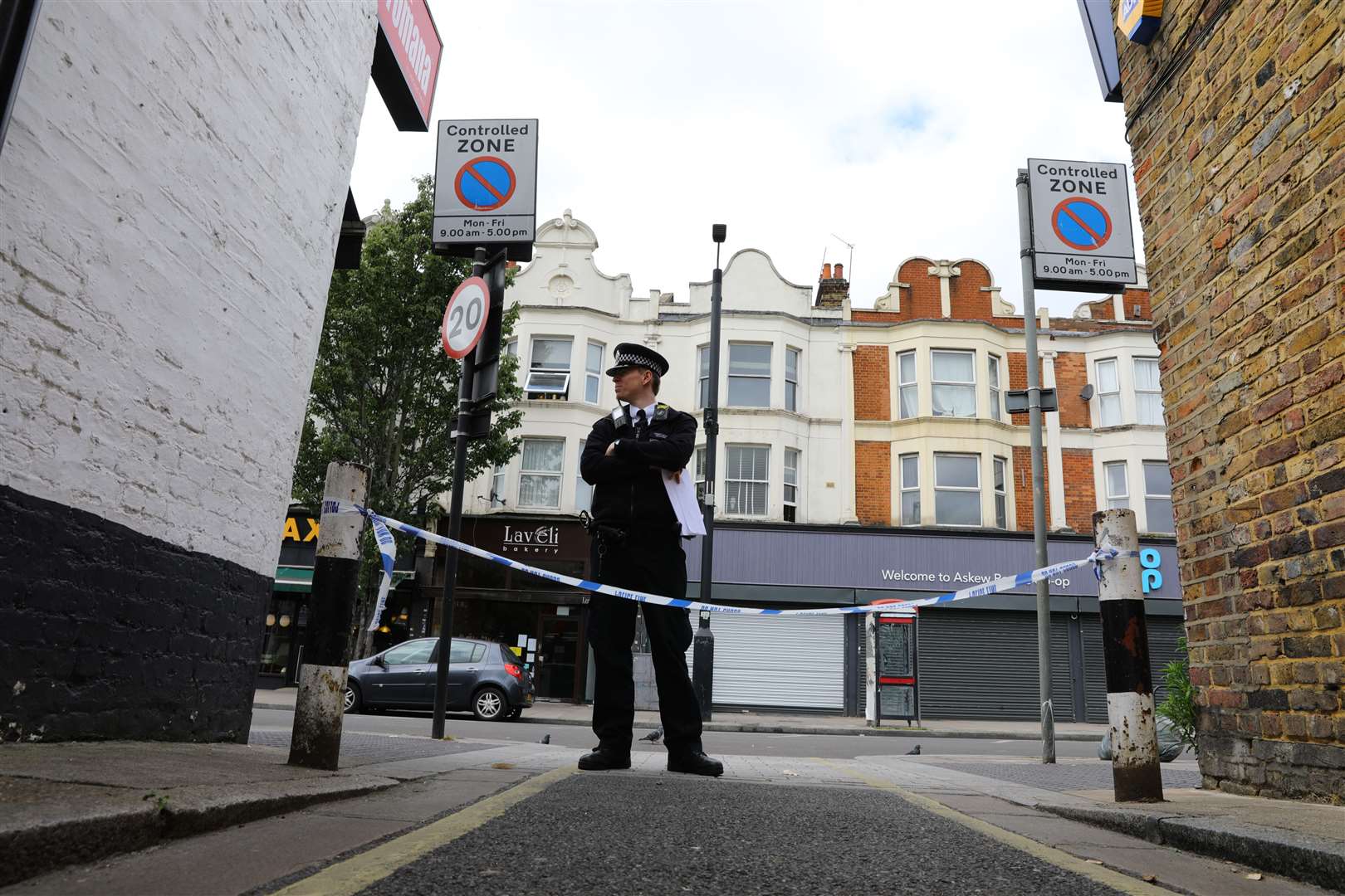 Police at the scene at Askew Road, Shepherd’s Bush (Aaron Chown/PA)