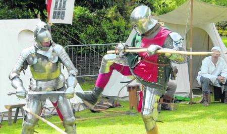 Canterbury Medieval History Festival at the Dane John Gardens in aid of The Cure Parkinson's Trust.A demonstration of Medieval fighting .