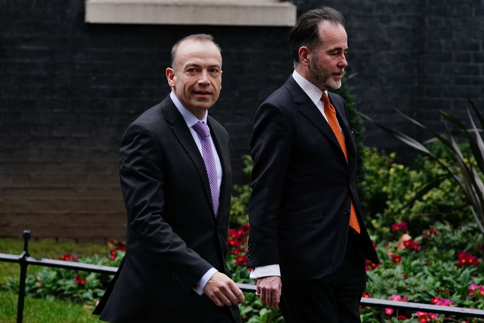 Chris Pincher (right) and chief whip Chris Heaton-Harris leave Downing Street following their appointments (Aaron Chown/PA)