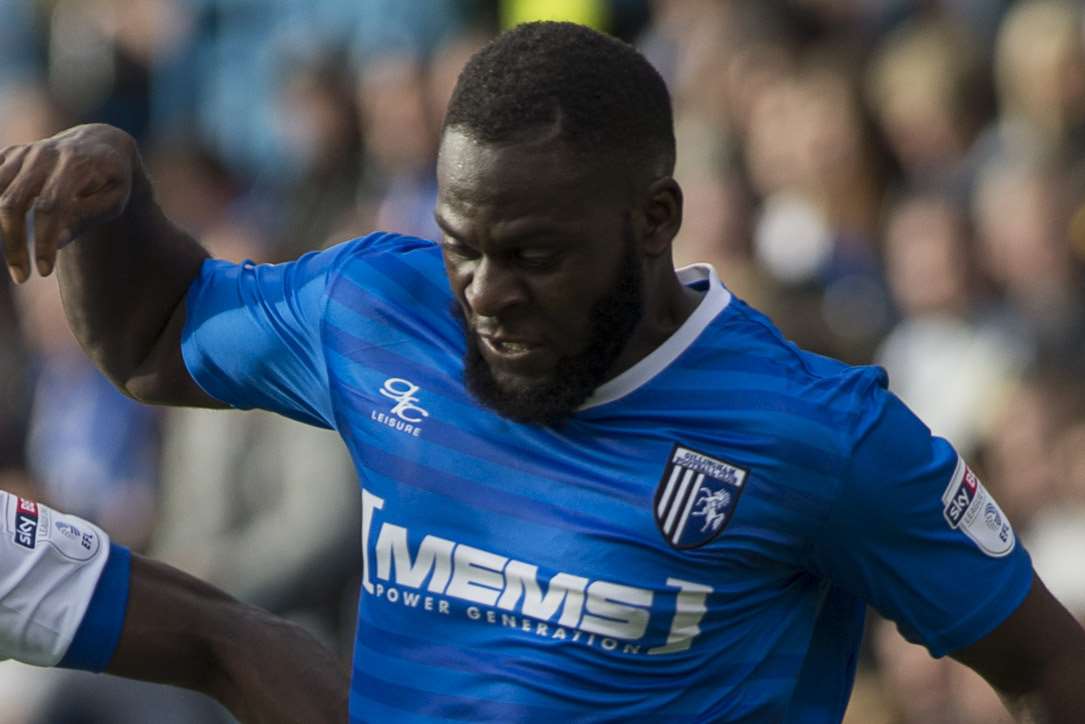 Frank Nouble battles with Oldham's Ousmane Fane on Saturday Picture: Andy Payton