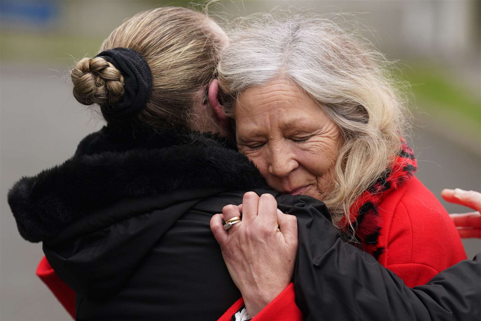 Stardust survivor Antoinette Keegan shares a hug after the verdicts were returned (Brian Lawless/PA)