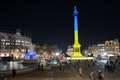 Landmarks turn yellow and blue in solidarity with Ukraine