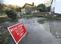 Water rushes into homes as flooding continues