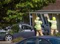 Car crashes through front door 