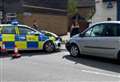 Pensioner taken to hospital after crash involving police car