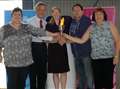 Paralympic torchbearers carry