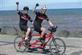 Father who lost sight after cardiac arrest earns Guinness World Record on tandem