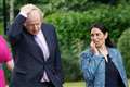 Boris Johnson backs Priti Patel in row with police over pay