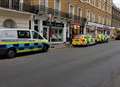 Woman falls from window in town centre incident