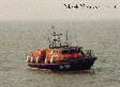 Ailing ship's captain aided by lifeboatmen