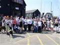 Sun shines on eager walkers