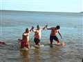 Chilly dippers take to sea