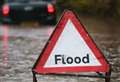 People rescued from stranded car during flooding