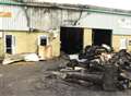 Arsonists damage warehouse and destroy cars