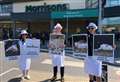 Animal rights activists stage chicken protest