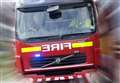 Shed fire spreads to conifers