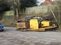 JCB overturns in tailback from earlier crash