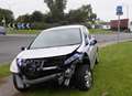 Driver crashes into railings on roundabout