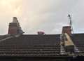 Man arrested after roof escape bid