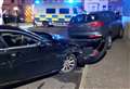 Suspected drink-driver crashes into back of parked car 