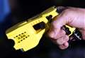 Police with Tasers arrest half-naked man