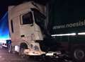 Lorry ploughs into parked vehicles