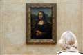 Protesters throw soup at Mona Lisa in Paris